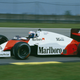 Alain Prost drives a McLaren-TAG Porsche in 1985. Photo credit: Mike King/Getty Images